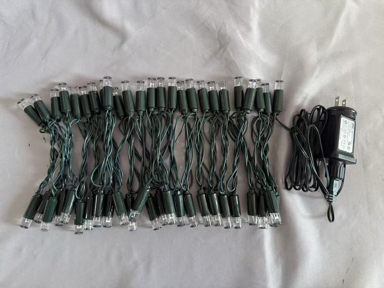 F10濃い緑色のLEDストリングライト50の温かい白い球根、9：1点滅比、15cm間隔