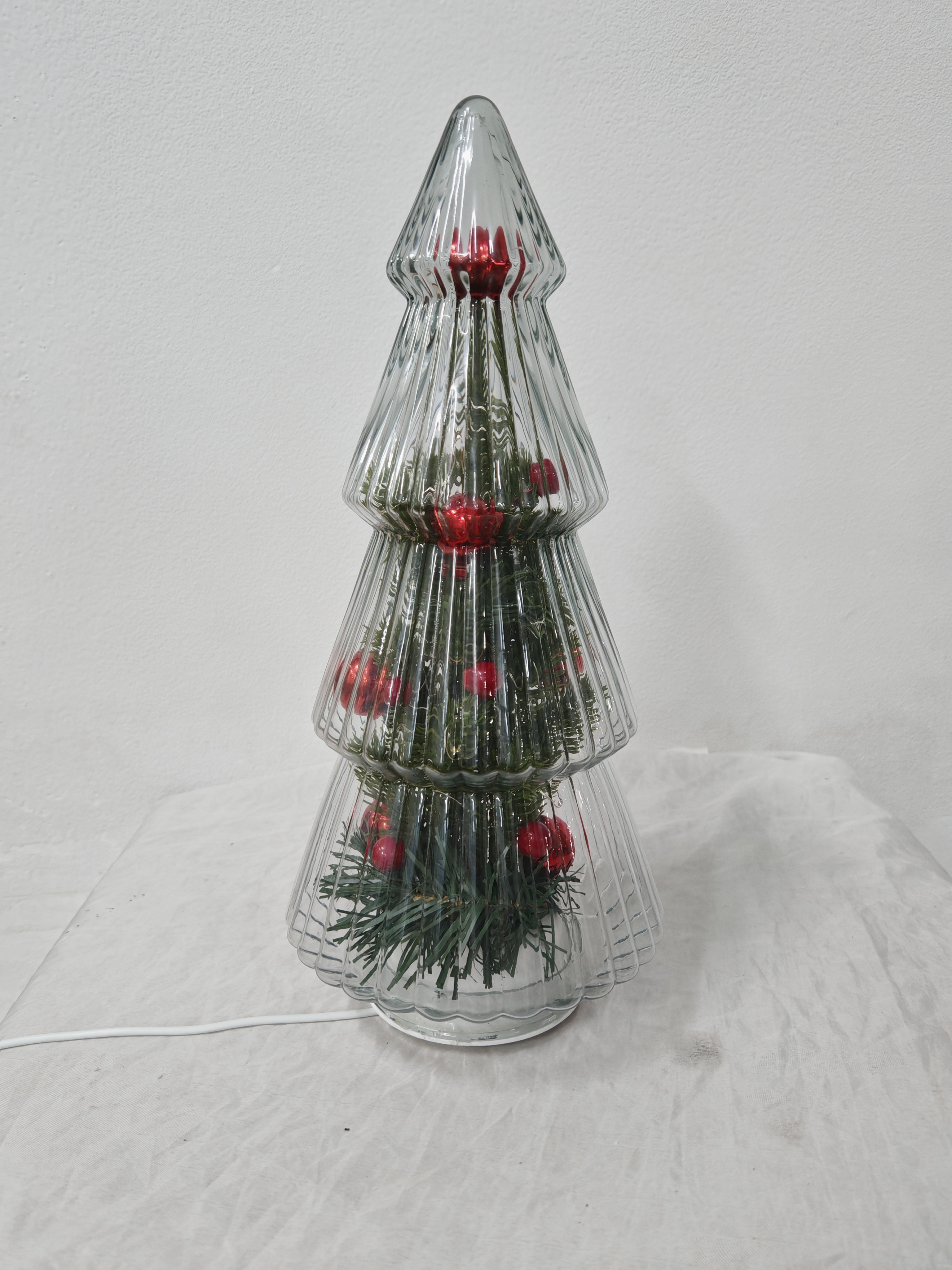 透明なガラス回転クリスマスツリー