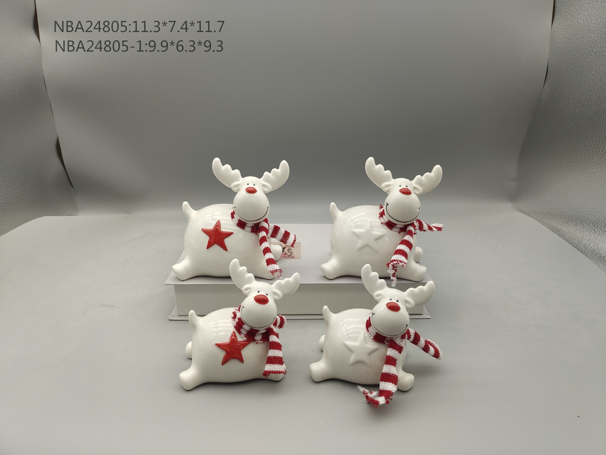 スカーフを持ってジャンプする磁器のトナカイ - 26