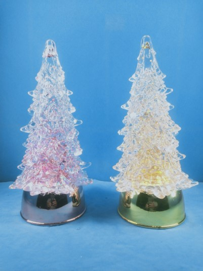 アクリル製の透明なクリスマスツリーのピンクと黄色のライト