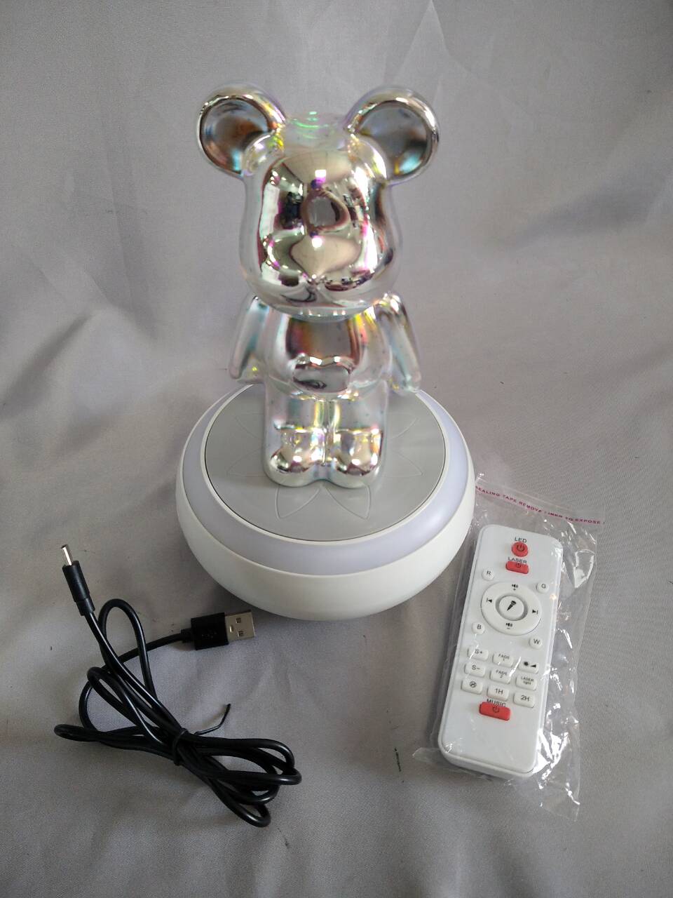 ダイナミックなライトショー、7色のLED雰囲気 +ビルトイン音楽の再生を備えた色を変える回転するベアスピーカーランプ