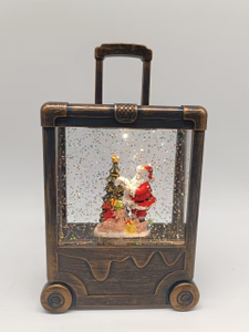 黒いブラシゴールドスーツケースランプサンタクロースと木のインテリアの飾り