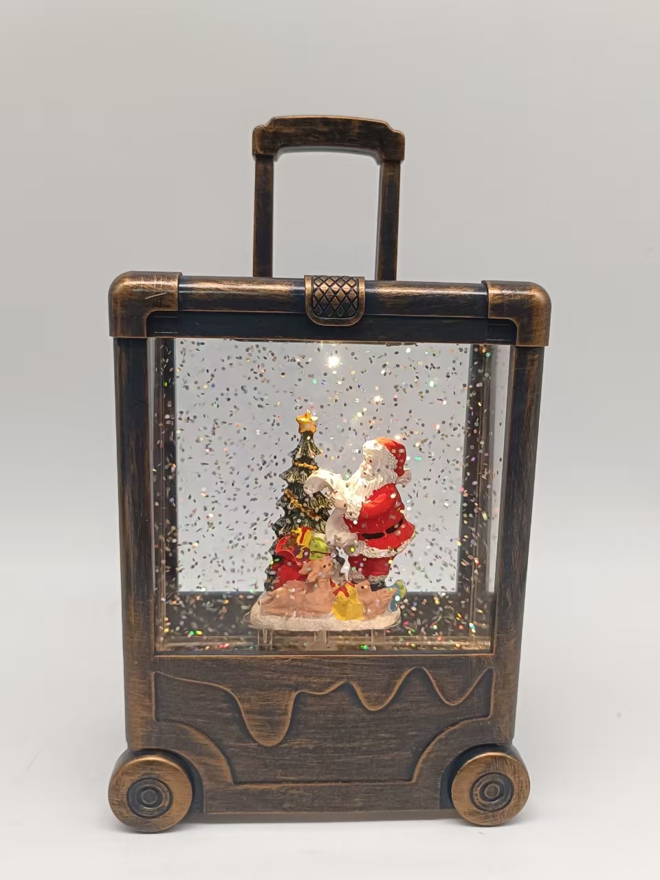 黒いブラシゴールドスーツケースランプサンタクロースと木のインテリアの飾り
